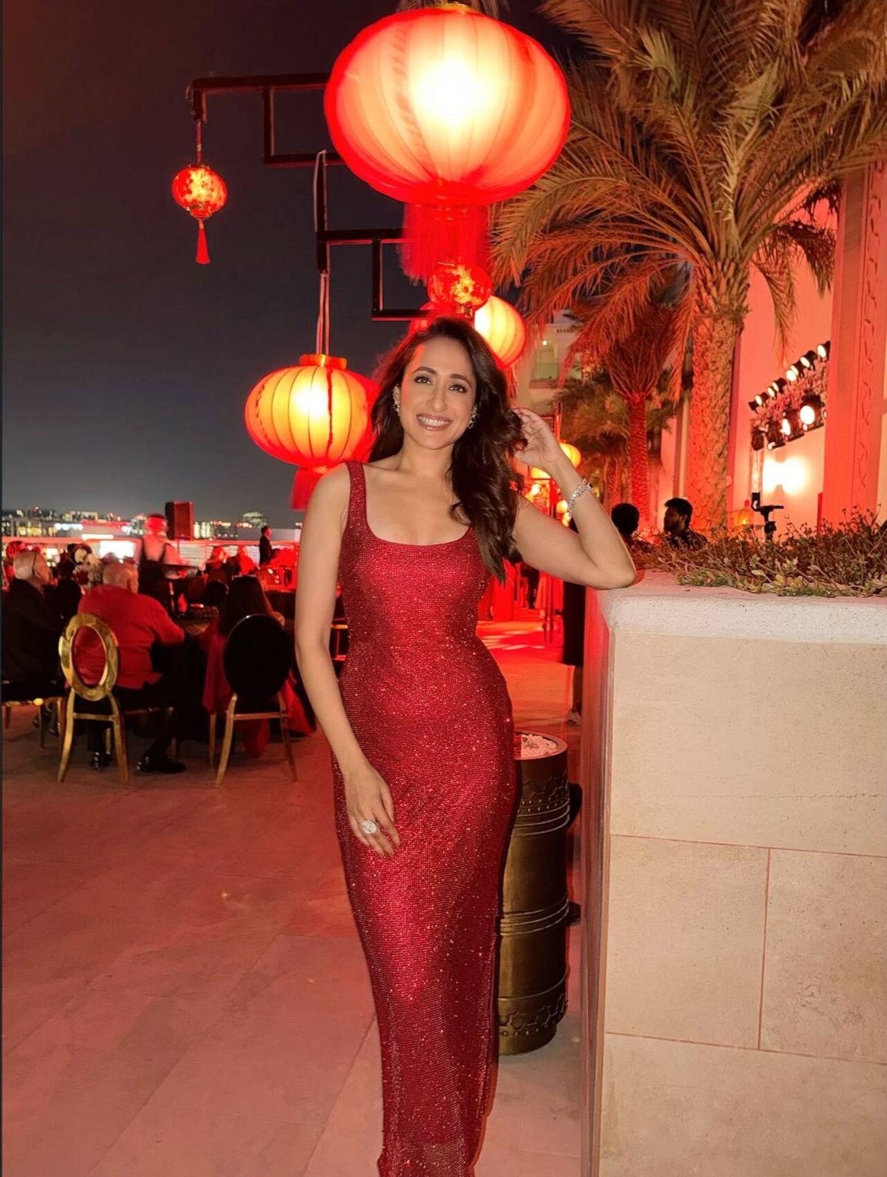 <p>Pragya Jaiswal looks absolutely ravishing in a long, shimmery red gown. The striking silhouette makes it an ideal pick for a glamorous New Year Eve celebration.</p>